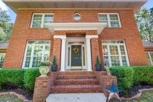 Front exterior photography of a Huntsville Alabama home listing