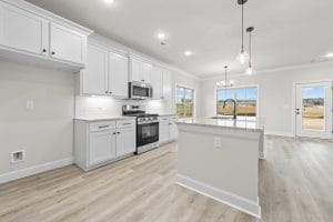 New construction kitchen and living area photographed for a Huntsville listing